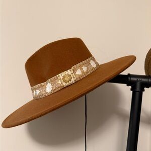 Chic Tan Wide-Brim Hat with Patterned Band